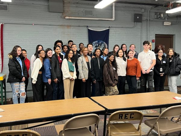 Massachusetts Attorney General Andrea Campbell, center, with members of the New Bedford Mayor’s Youth Council and other local high schoolers.