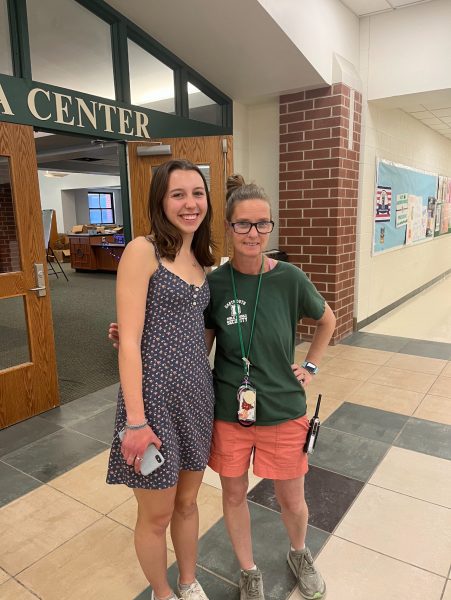 Assistant Editor Jordan Rosenberg poses with DHS security guard Tara Rose.